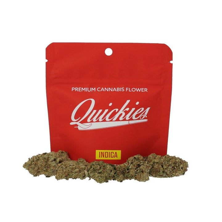 Quickies 1 Oz Premium Flower INDICA in a red resealable bag with cannabis buds displayed in front, offering a high THC content for stress relief and better sleep.