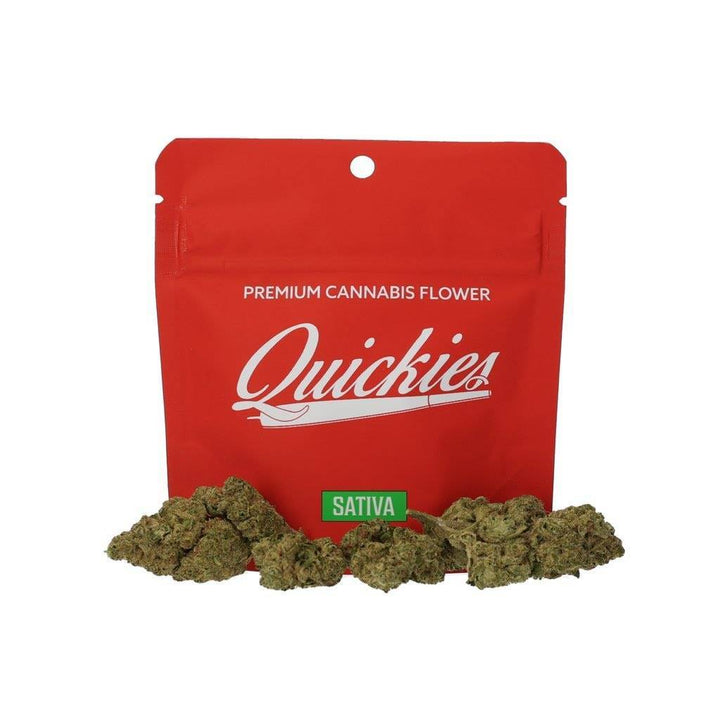 Quickies Premium Flower SATIVA cannabis buds with over 30% THC, displayed in front of a red resealable packaging labeled 'Premium Cannabis Flower.'